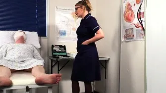 Busty nurse in uniform shows her big boobs