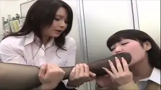 Hot Japanese Femdom In Nylon Stockings Gets Her Feet Worshipped By A Sexy Girl At The Office